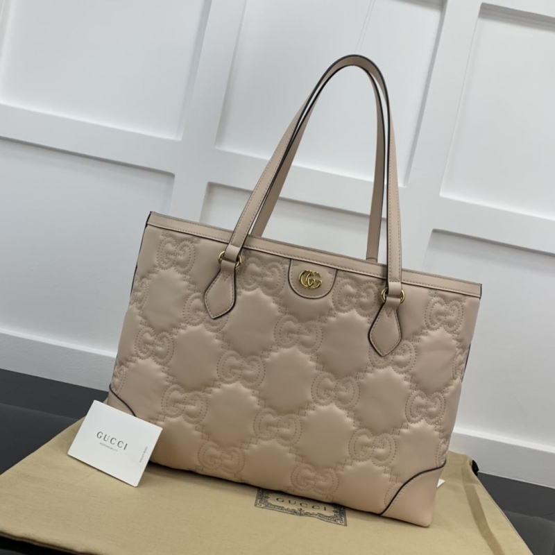 G*u*i shopping bags